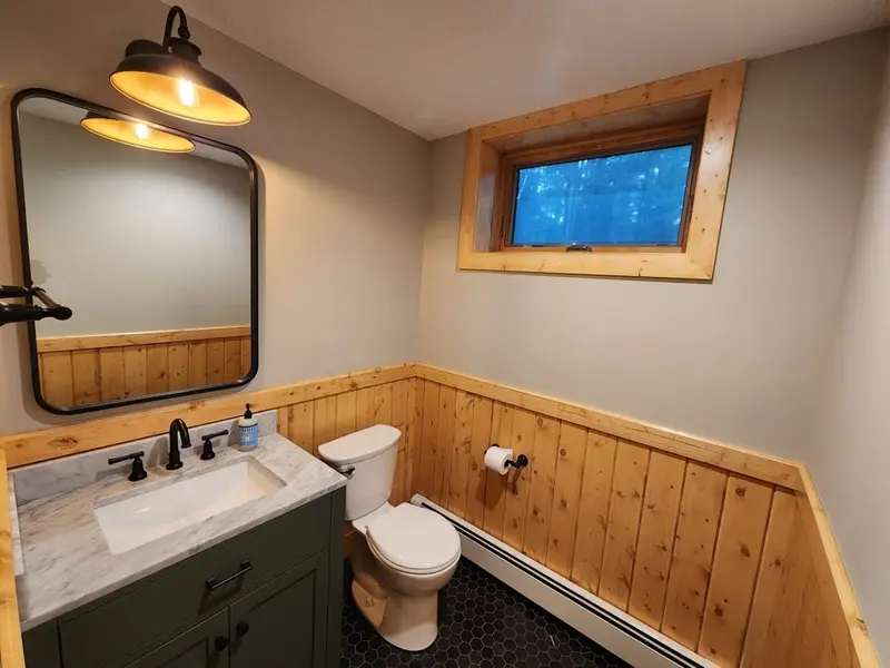 Bathroom remodel with pine wainscot