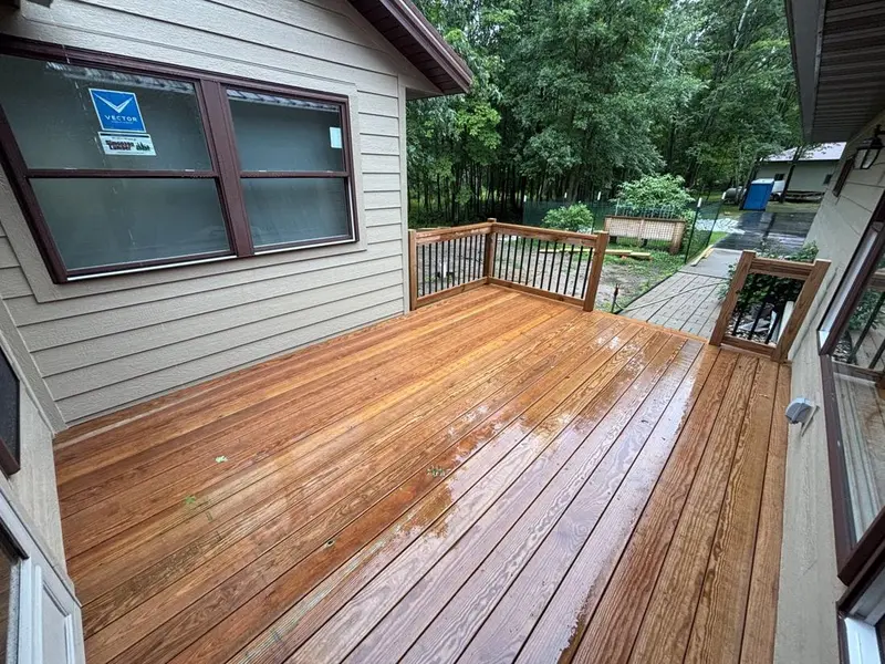Room addition with deck by Tri-County Professional Builders