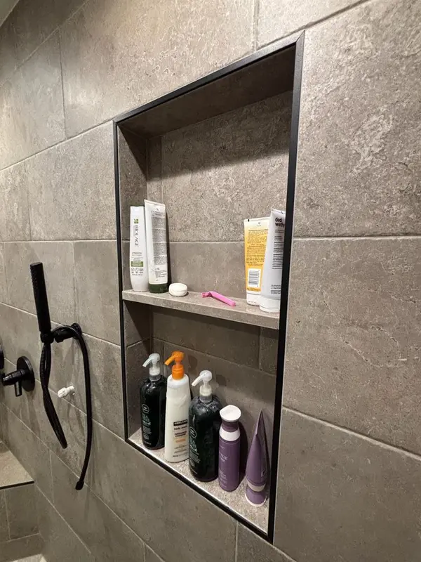 Bigger bathroom with a walk-in shower by Tri-County Professional Builders