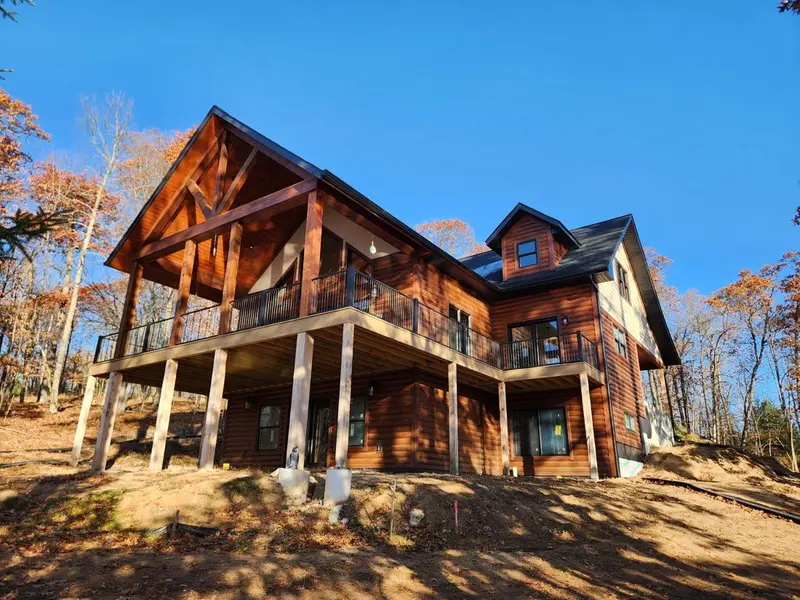 Custom lake home with large deck and covered porch